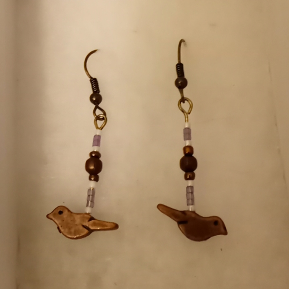 Purple and white dove earrings.